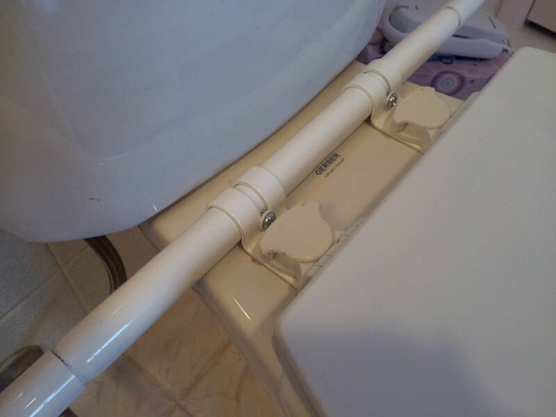 How to install hand rails on a home toilet.