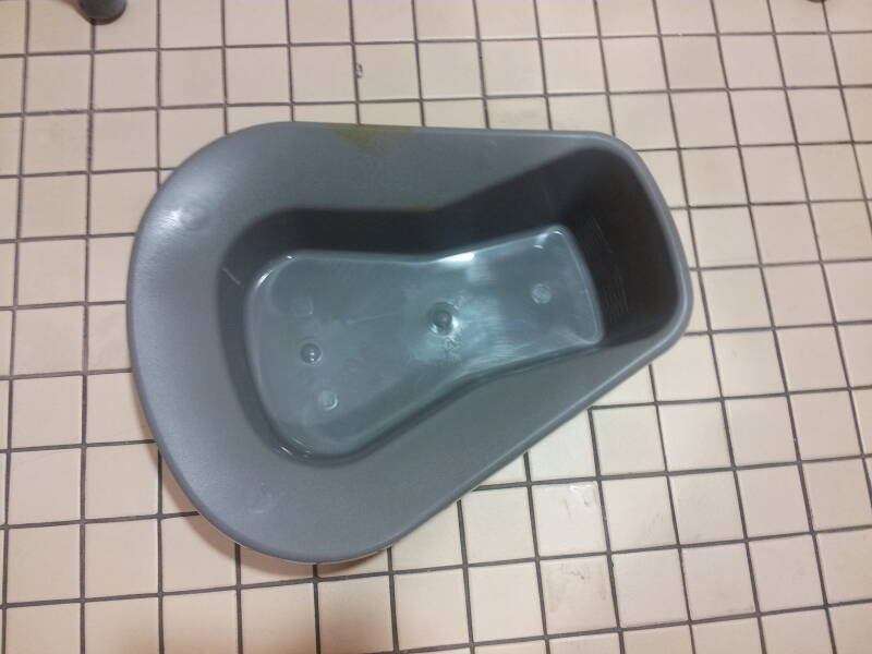 Standard plastic bedpan.