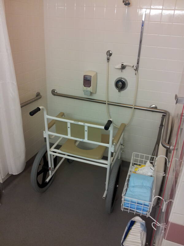 Rehabilitation facility shower with waterproof wheelchair.