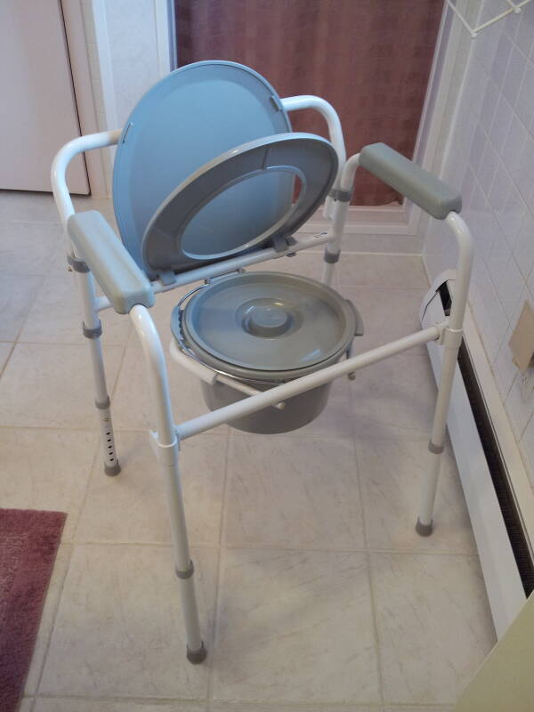 Modern 'close stool' type commode for home health care.