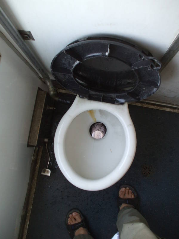 Awful toilet spraying urine mist on an Italian train.