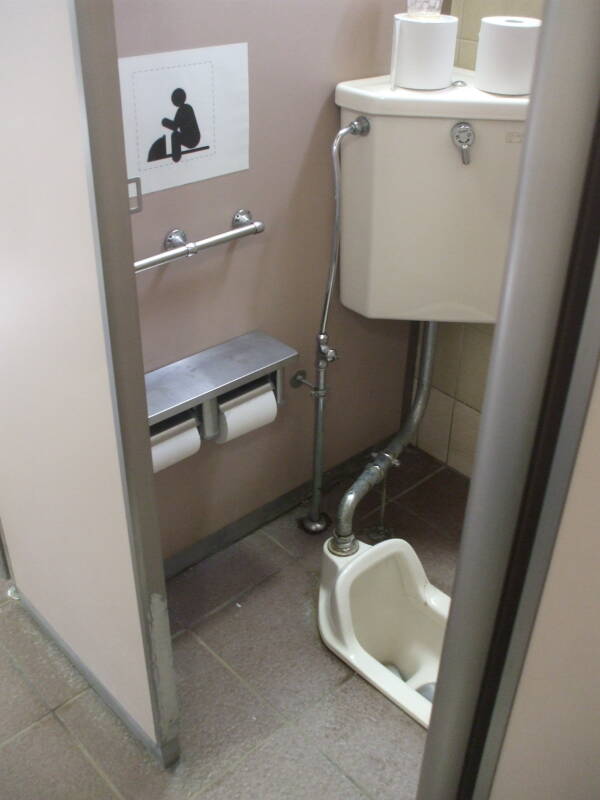 Squat toilet at Hachiman-gu shrine in Kamakura.