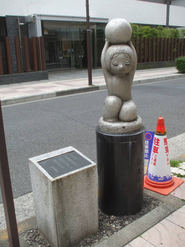 Kappa statue outside a kitchen supply store in Kappabashi-dori or Kitchen Town district of Tokyo.