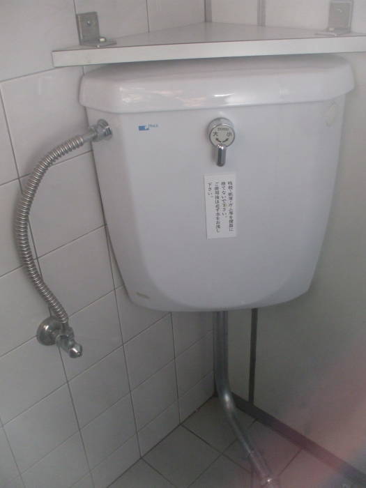 Dual-flush squat toilet at the Heian-jingu shrine in Kyōto.
