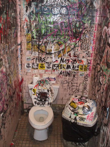 Toilet in Welcome To The Johnson's Bar on Rivington Street on the Lower East Side in New York.