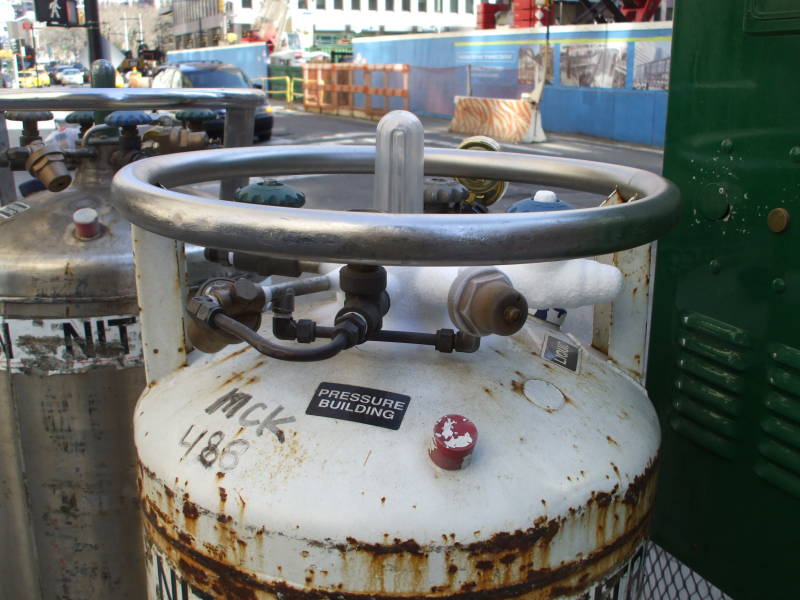 Dewar vacuum flasks of liquid nitrogen on Broadway in New York, on the edge of the Financial District.