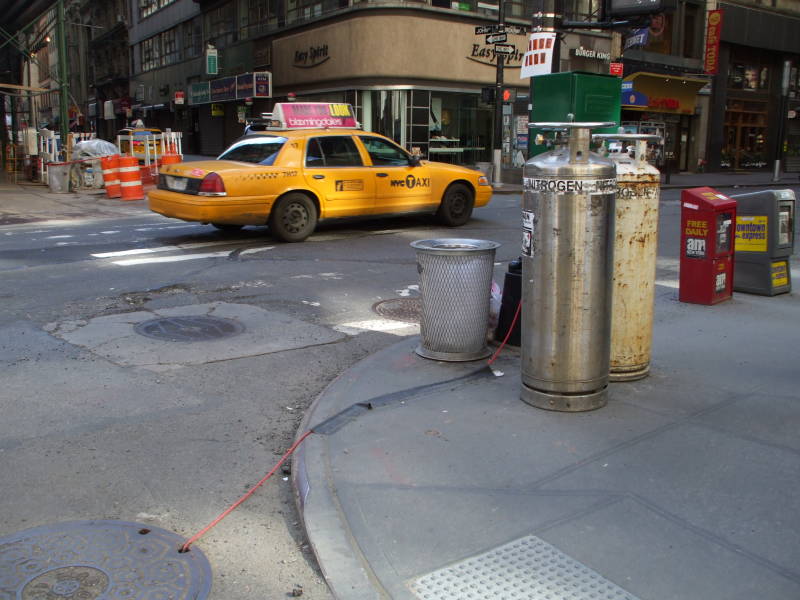 Dewar vacuum flasks of liquid nitrogen on Broadway in New York, on the edge of the Financial District.