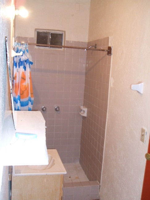 Bathroom vanity, sink, and shower at Motel Paraiso, Tecate, Mexico.