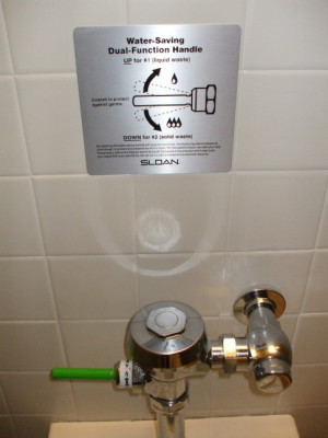 Water-saving toilet handle for #1 and #2.