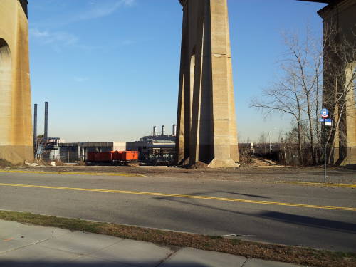 Wards Island Wastewater Treatment Plant seen underneath the Hell Gate railway bridge.