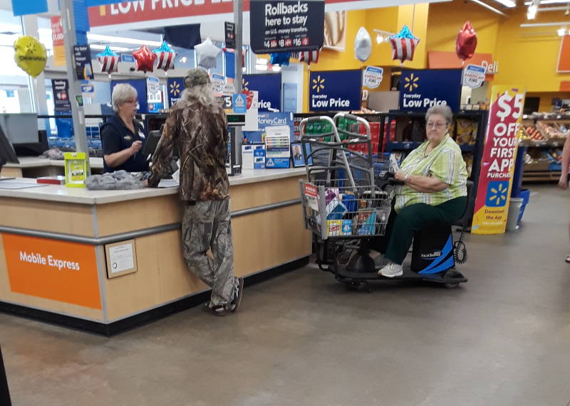 Man wearing 3 camouflage patterns at once in southern Indiana.