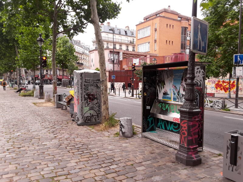 A steel pissoir along the Canal Saint Martin in Paris.