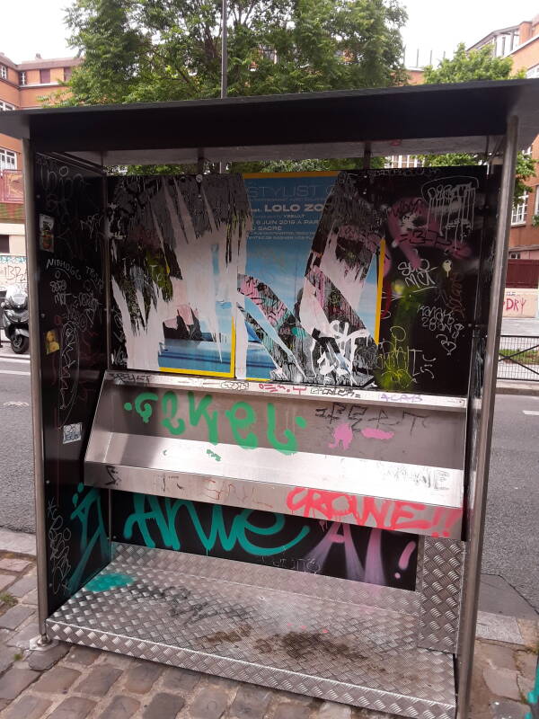 A steel pissoir along the Canal Saint Martin in Paris.