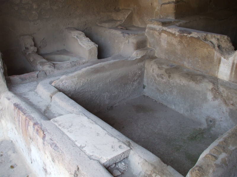 Urine-powered wool fulling facility at Pompeii.