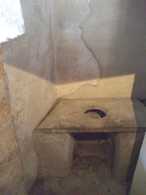 Roman brothel toilet in Pompeii, Italy.