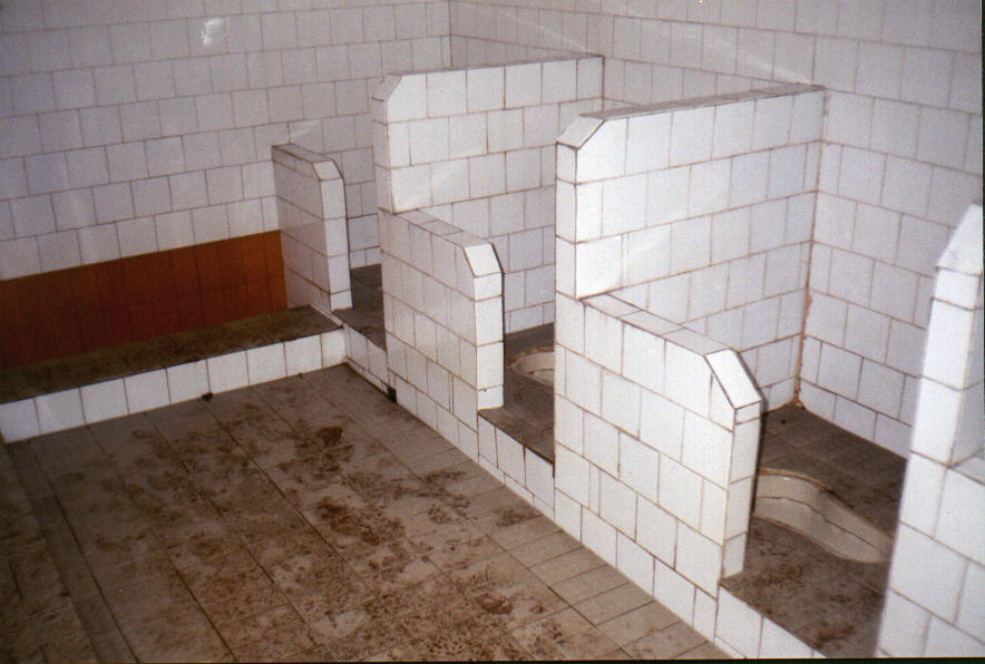 Squat toilet in Guanzhou, China.