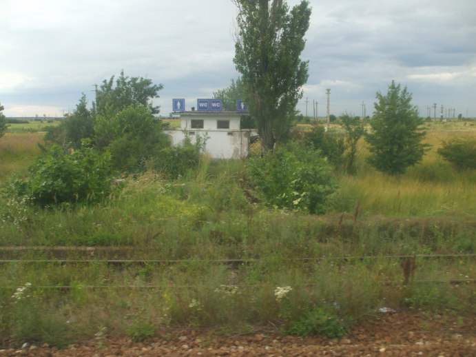 Public toilet in the middle of nowhere in the Romanian oil fields.