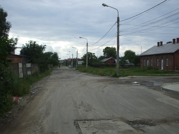 Street in front of the train station in Suceava, Romania.