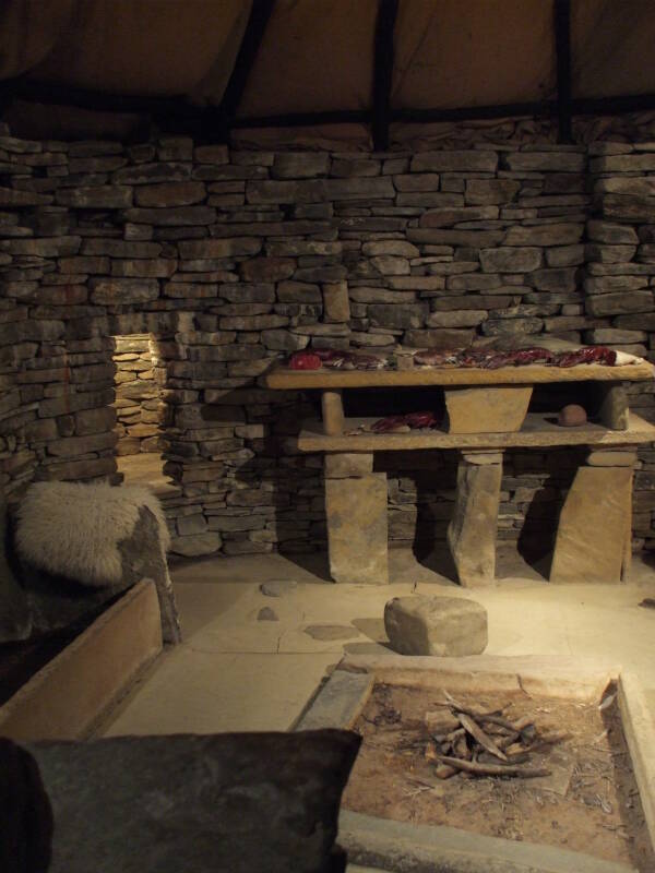 Reconstructed House 7 of Skara Brae Neolithic settlement beside the Bay of Skaill in the Orkney Islands.