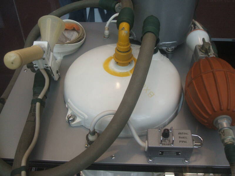 Soviet or Russian Soyuz spacecraft toilet configured for male use.