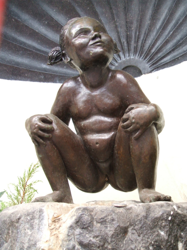 Peeing girl statue in Brussels, Belgium.