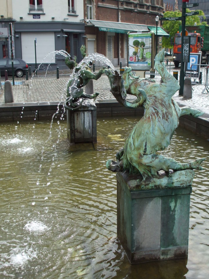 Statues of vomiting goats in Brussels, Belgium.