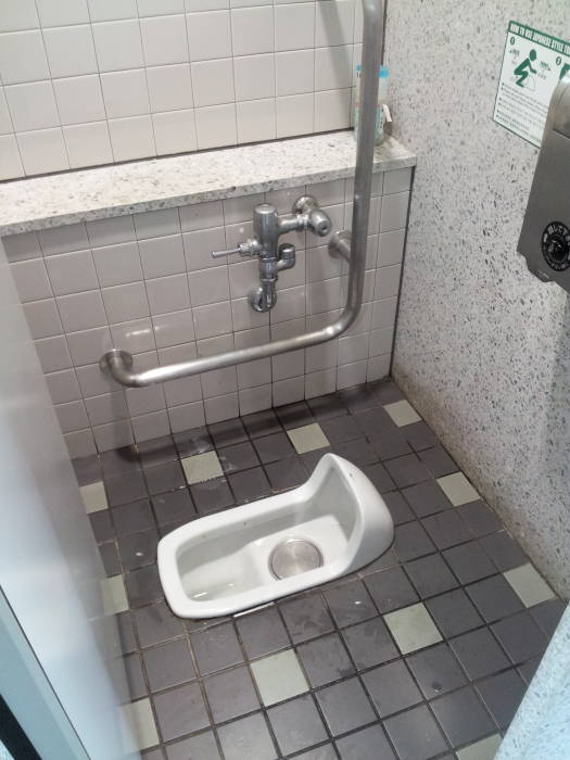 Squat toilet at the Imperial Palace in Tokyo.