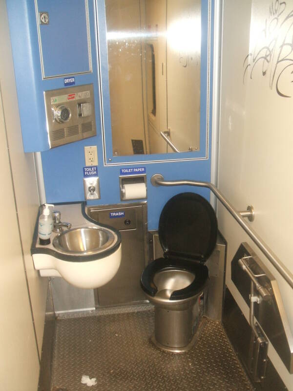 Stainless steel toilet on board a MARC train from Washington to Baltimore.