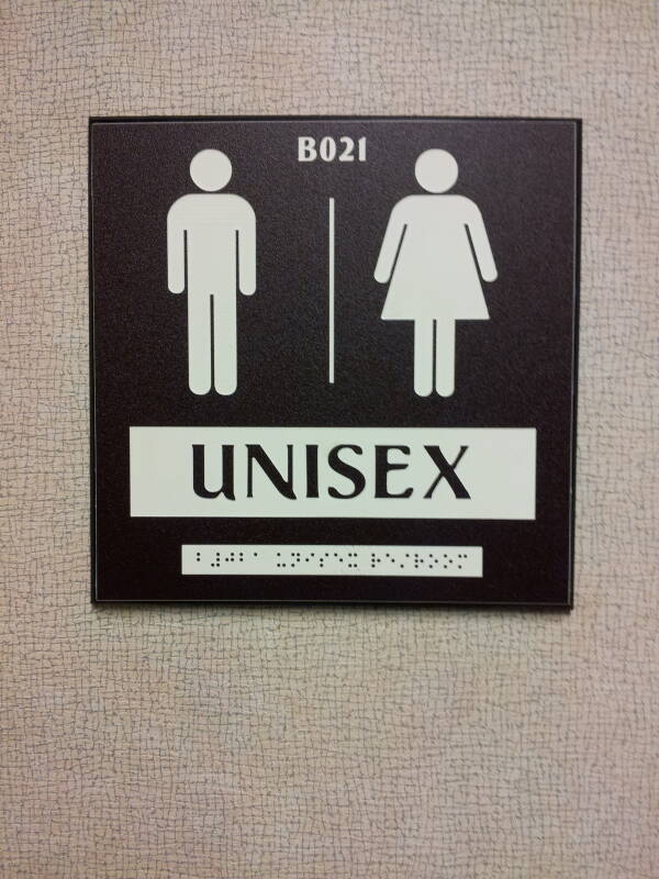 Signs at entry to unisex restroom at Purdue University.