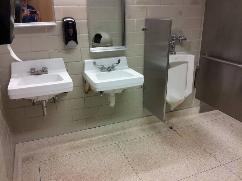 Two sinks and a urinal in a unisex restroom at Purdue University.