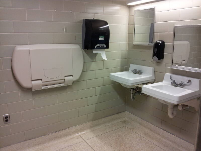 Signs at entry to unisex restroom at Purdue University.