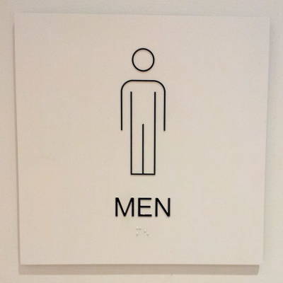Men's bathroom sign at the Whitney Museum in New York.
