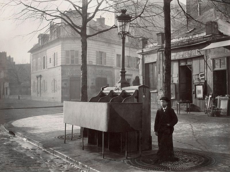 Photograph by Charles Marville around 1865, public domain, from https://www.smithsonianmag.com/smart-news/how-paris-open-air-urinals-changed-cityand-helped-dismantle-nazi-regime-180973704/