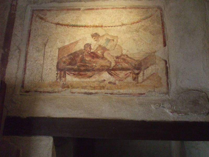 Erotic fresco in the Lupanaro, a Roman brothel at Pompeii.