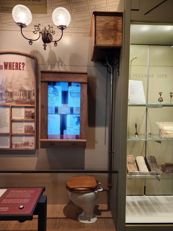 Toilet and elevated flush tank.
