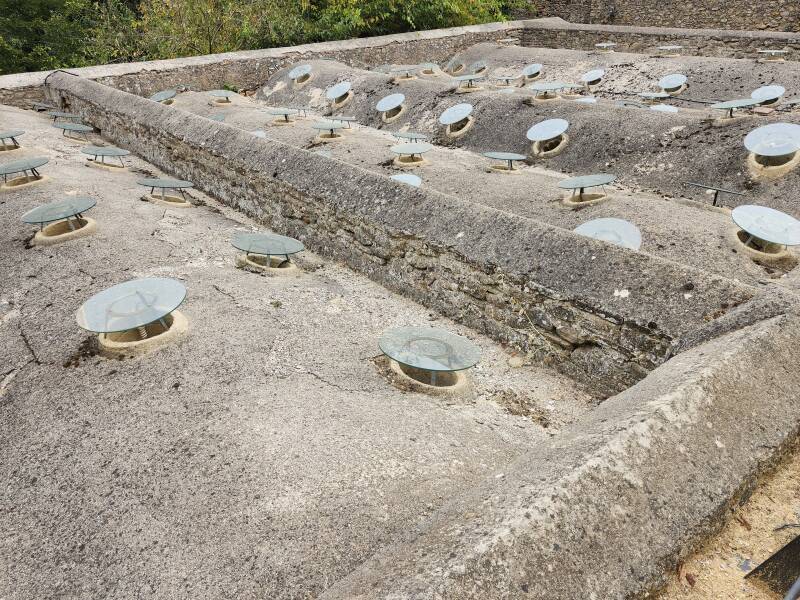 Half-barrel vaulted roofs.