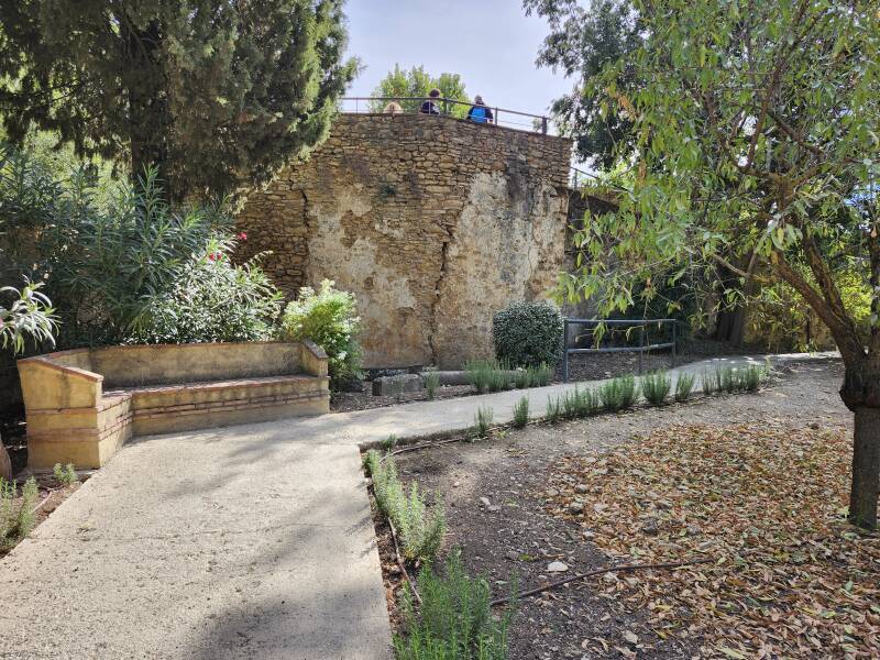 Noria tower at the back corner of the garden.