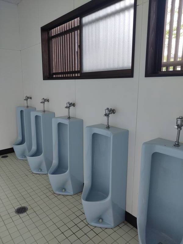 Urinals in the public toilet next to the Shozen-in Koganedo in Toge or Touge town.